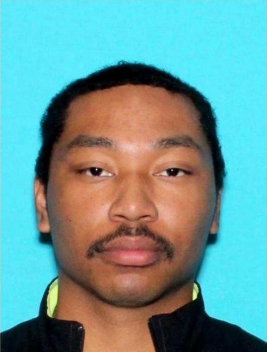Official photo of Tamura released by authorities, showing him in a permit-style portrait Official photo of Tamura released by authorities, showing him in a permit-style portrait