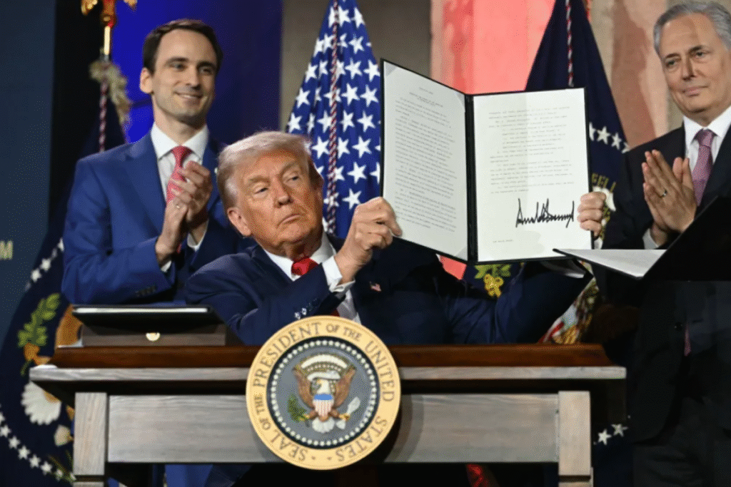 Trump AI Action Plan 2025: Trump signing an executive order at the “Winning the AI Race” summit