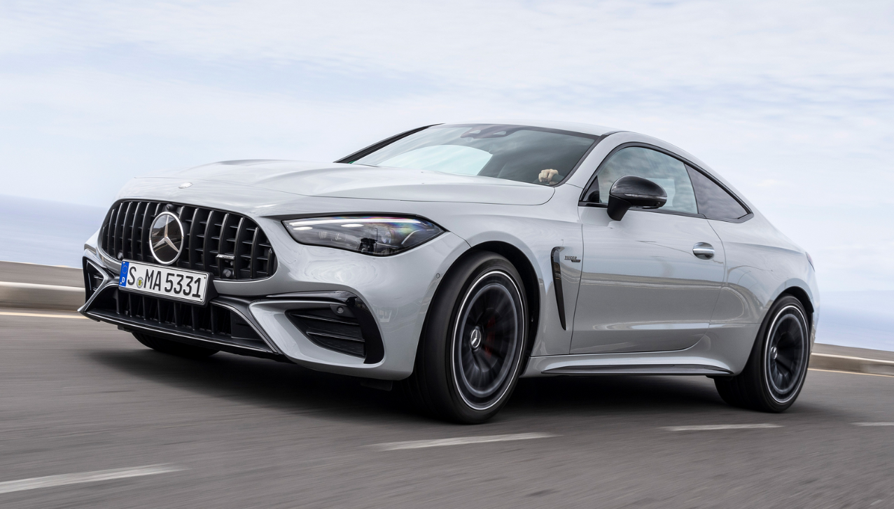 A side profile view in silver highlighting flared fenders, wider stance, and 19‑inch alloy wheels. A side profile view in silver highlighting flared fenders, wider stance, and 19‑inch alloy wheels.